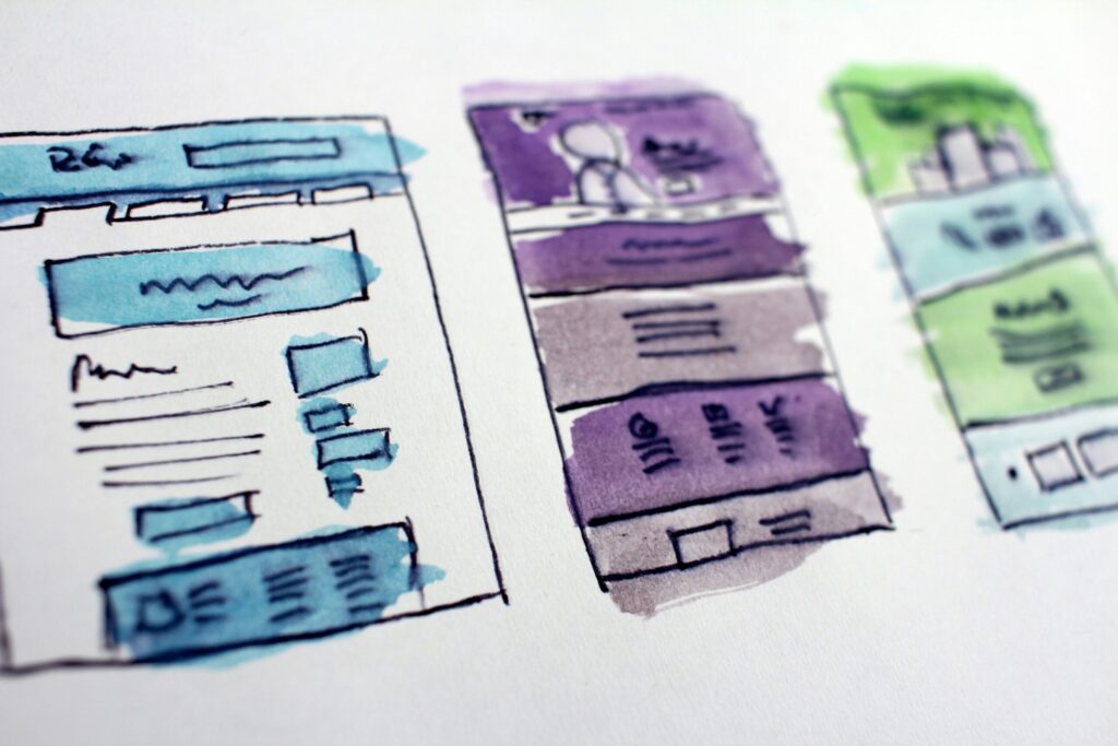 Watercolor wireframe sketches of website layouts. Figma AI tricks